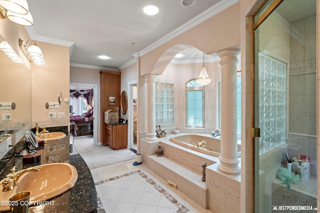 2215 S Austin Cir, Palmer, AK 99645 - bathroom with decorative columns, a bath, double vanity, tile patterned floors, and a stall shower