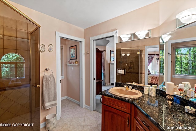 2215 S Austin Cir, Palmer, AK 99645 - bathroom featuring a stall shower, vanity, and tile patterned floors