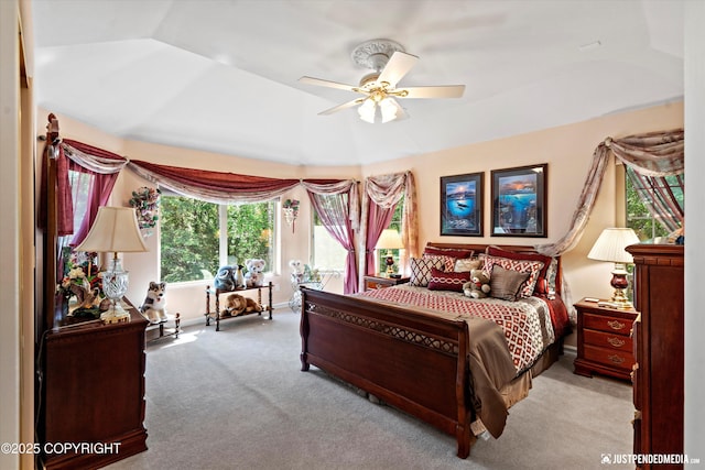 2215 S Austin Cir, Palmer, AK 99645 - bedroom with carpet, vaulted ceiling, ceiling fan, and access to exterior