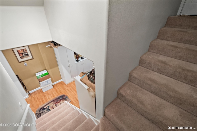 2215 S Austin Cir, Palmer, AK 99645 - stairs with wood finished floors and baseboards
