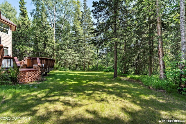 2215 S Austin Cir, Palmer, AK 99645 - view of green lawn featuring a wooden deck