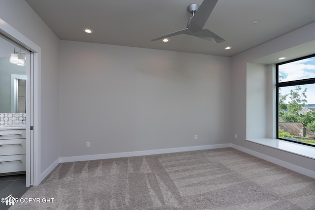 528 Coastal Pl # 1, Anchorage, AK 99501 - carpeted empty room featuring a ceiling fan, recessed lighting, and baseboards