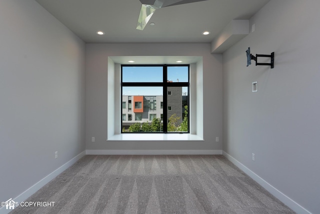 528 Coastal Pl # 1, Anchorage, AK 99501 - carpeted spare room with baseboards, recessed lighting, and a skylight
