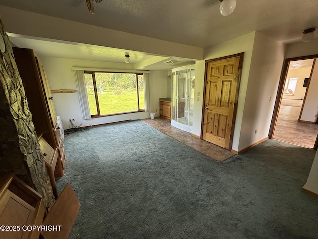 9810 N Runyon Cir, Palmer, AK 99645 - unfurnished living room with dark carpet