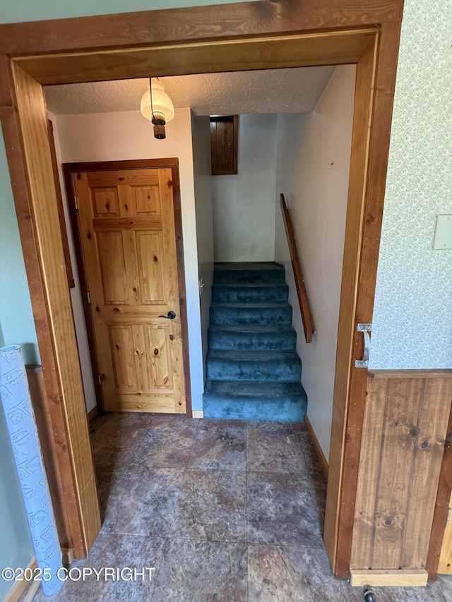 9810 N Runyon Cir, Palmer, AK 99645 - staircase with wallpapered walls