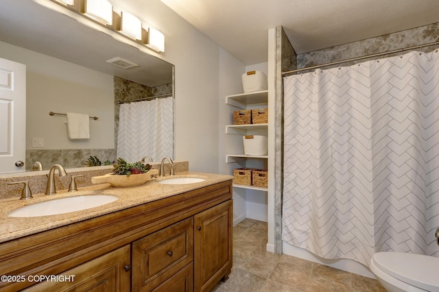 6831 Cheryl St, Anchorage, AK 99518 - full bathroom featuring double vanity, toilet, curtained shower, and tile patterned flooring
