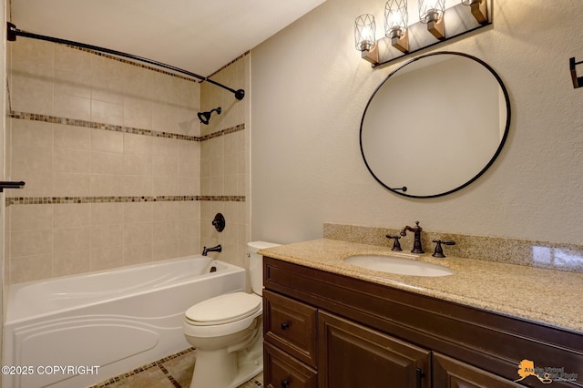 3135 Delta Dr, Anchorage, AK 99502 - bathroom with vanity, toilet, bathtub / shower combination, tile patterned floors, and a textured wall