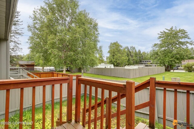 3135 Delta Dr, Anchorage, AK 99502 - view of wooden deck