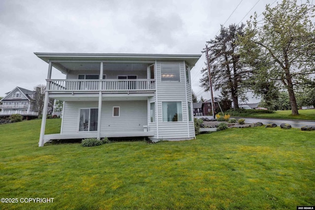 101 Jeff Davis St, Sitka, AK 99835 - back of property featuring a balcony and a lawn
