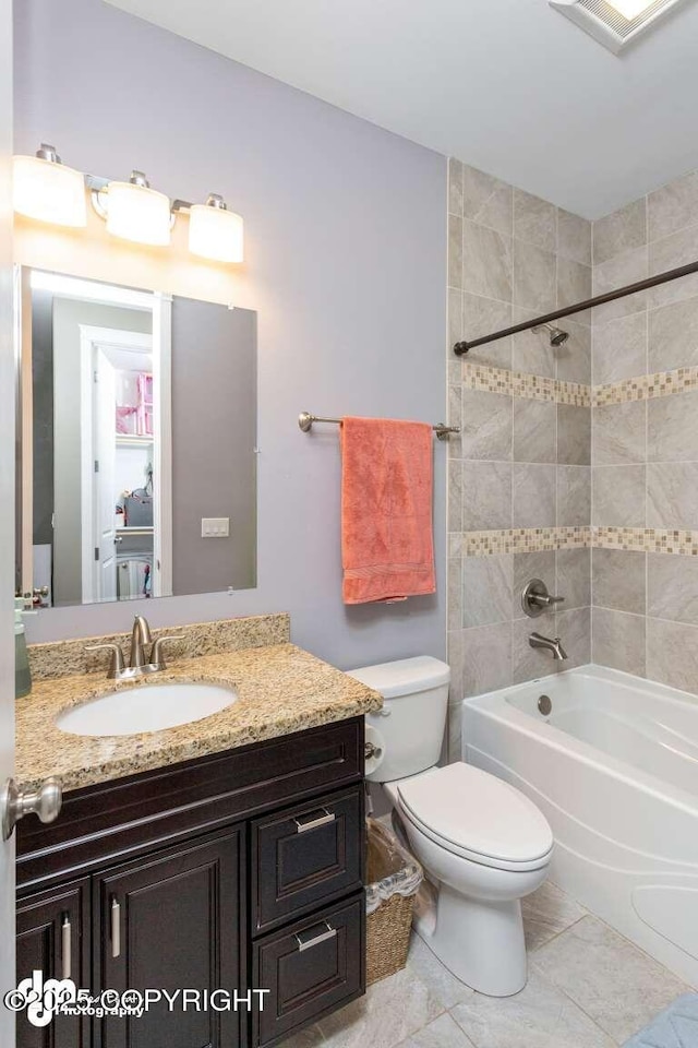 5044 E Loft Cir, Wasilla, AK 99654 - bathroom featuring toilet, vanity, and shower / washtub combination