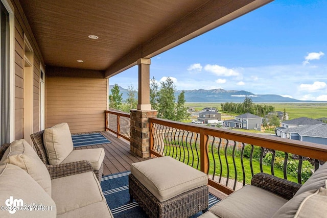 5044 E Loft Cir, Wasilla, AK 99654 - wooden deck featuring a mountain view and outdoor lounge area