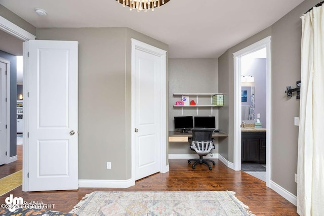 5044 E Loft Cir, Wasilla, AK 99654 - bedroom with wood finished floors, a desk, baseboards, and ensuite bathroom