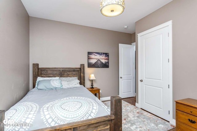 5044 E Loft Cir, Wasilla, AK 99654 - bedroom featuring wood finished floors and baseboards