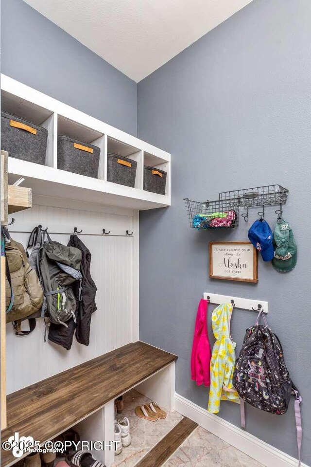 5044 E Loft Cir, Wasilla, AK 99654 - mudroom with marble finish flooring and baseboards