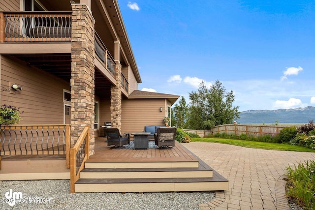 5044 E Loft Cir, Wasilla, AK 99654 - view of patio / terrace with outdoor lounge area and a deck with mountain view