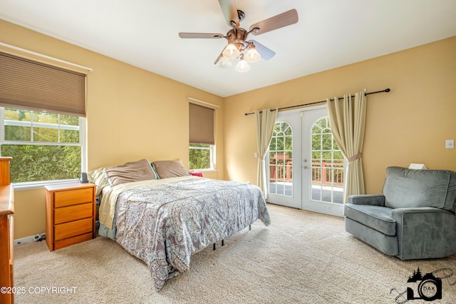 3474 E Wanamingo Dr, Wasilla, AK 99654 - bedroom featuring access to outside, light colored carpet, multiple windows, and french doors