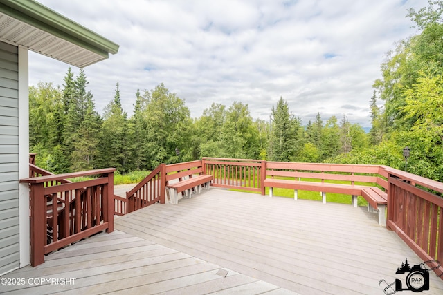 3474 E Wanamingo Dr, Wasilla, AK 99654 - wooden deck with a view of trees