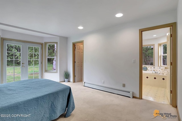 1101 E Dan St, Wasilla, AK 99654 - bedroom featuring a baseboard radiator, carpet, french doors, recessed lighting, and access to outside