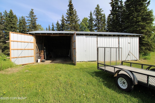 63550 Jessica G Ct, Ninilchik, AK 99639 - view of pole building with a lawn