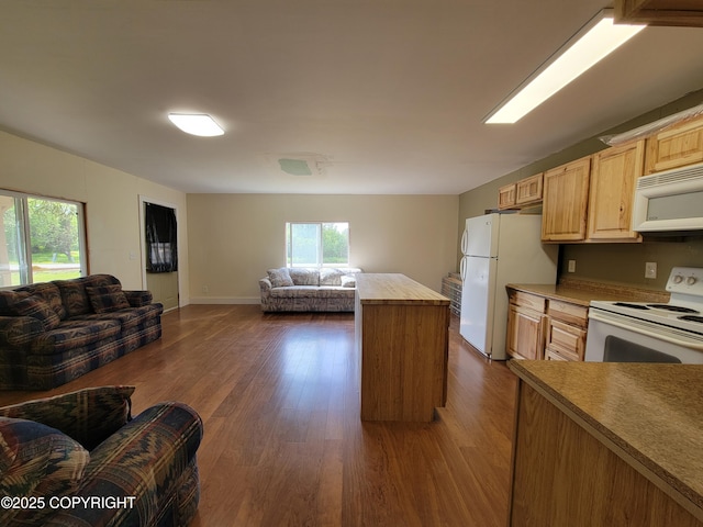 63550 Jessica G Ct, Ninilchik, AK 99639 - kitchen with white appliances, open floor plan, dark wood finished floors, and a center island