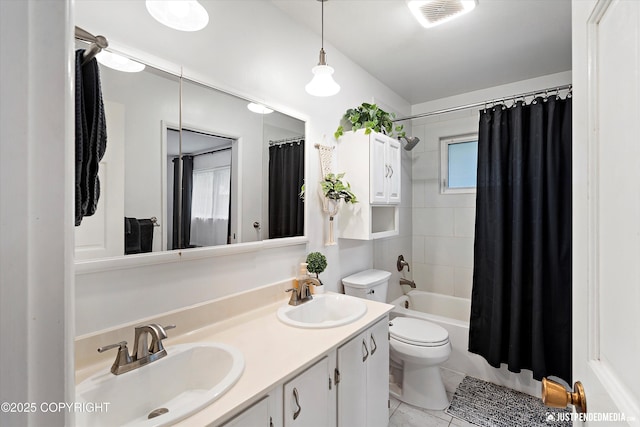 811 Bounty Dr, Anchorage, AK 99515 - bathroom with toilet, double vanity, and shower / tub combo with curtain