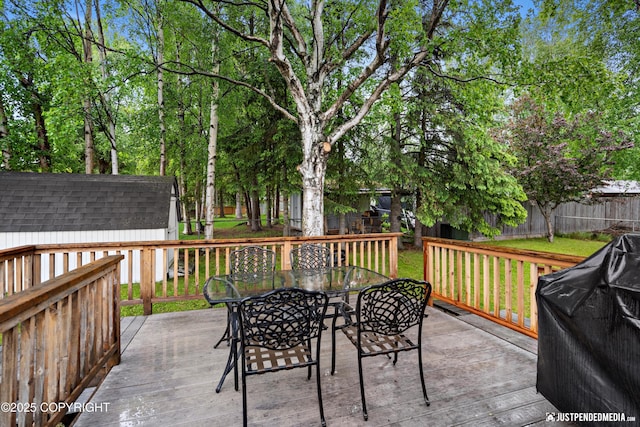 811 Bounty Dr, Anchorage, AK 99515 - view of patio with outdoor dining space, a wooden deck, and grilling area