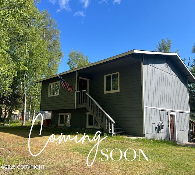 830 N Day Rd, Wasilla, AK 99654 - view of front of home featuring a front yard and stairs