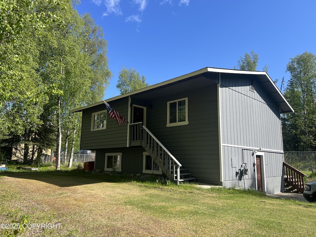 830 N Day Rd, Wasilla, AK 99654 - back of property with stairway and a yard