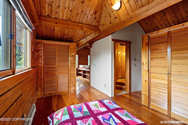 7550 E Fireweed Rd, Palmer, AK 99645 - unfurnished bedroom featuring wood finished floors and wooden ceiling