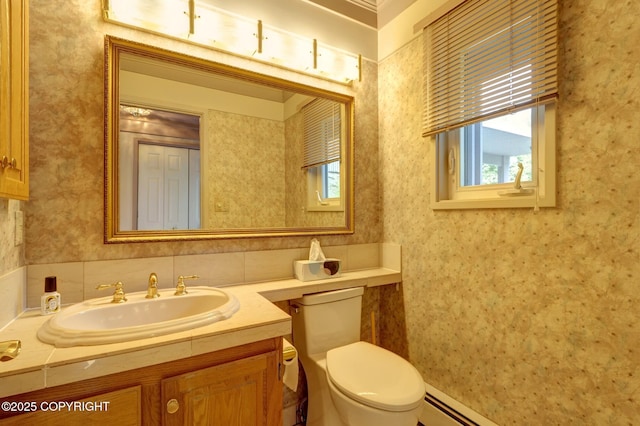 836 O Pl, Anchorage, AK 99501 - half bathroom featuring plenty of natural light, toilet, and vanity