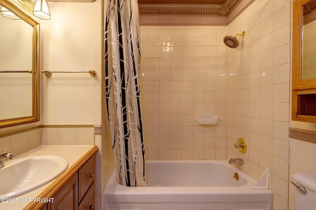 836 O Pl, Anchorage, AK 99501 - bathroom featuring shower / bath combo, vanity, toilet, and wainscoting