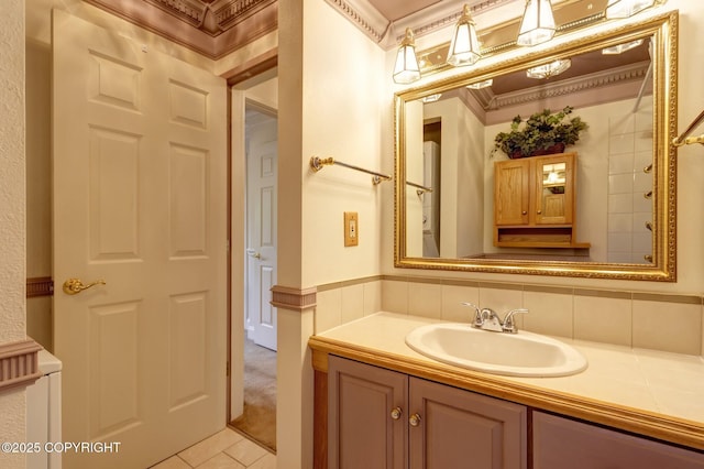 836 O Pl, Anchorage, AK 99501 - bathroom featuring vanity, tile patterned flooring, and ornamental molding