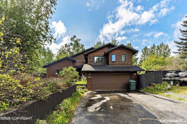 2020 N Kentucky Derby Dr, Palmer, AK 99645 - rustic home with driveway and an attached garage