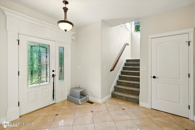 4920 W Fairview Loop, Wasilla, AK 99654 - entrance foyer featuring stairway and light tile patterned flooring