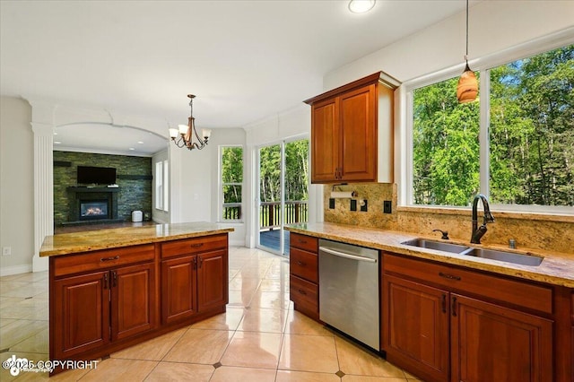 4920 W Fairview Loop, Wasilla, AK 99654 - kitchen featuring dishwasher, plenty of natural light, tasteful backsplash, and light tile patterned floors
