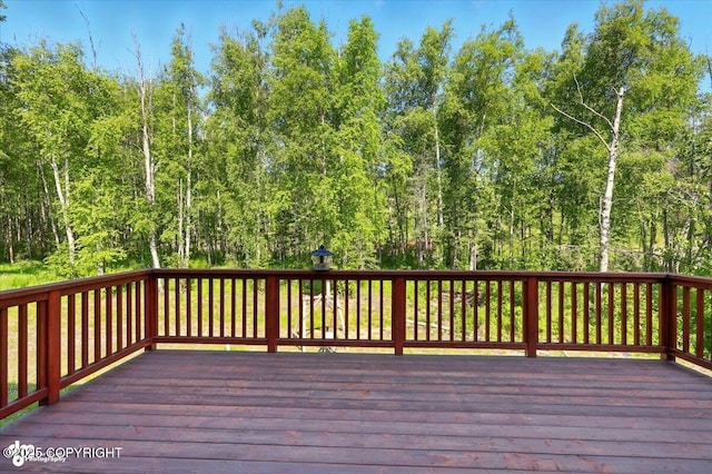 4920 W Fairview Loop, Wasilla, AK 99654 - wooden deck with a view of trees