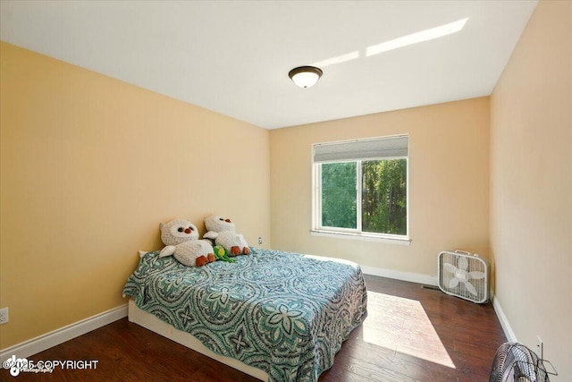 4920 W Fairview Loop, Wasilla, AK 99654 - bedroom featuring wood finished floors and baseboards