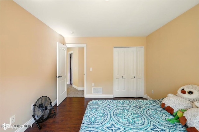 4920 W Fairview Loop, Wasilla, AK 99654 - bedroom featuring wood finished floors and a closet
