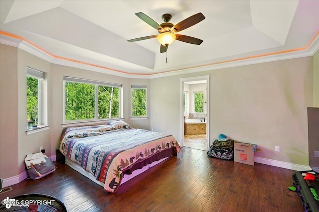 4920 W Fairview Loop, Wasilla, AK 99654 - bedroom with a tray ceiling, multiple windows, hardwood / wood-style floors, and ornamental molding