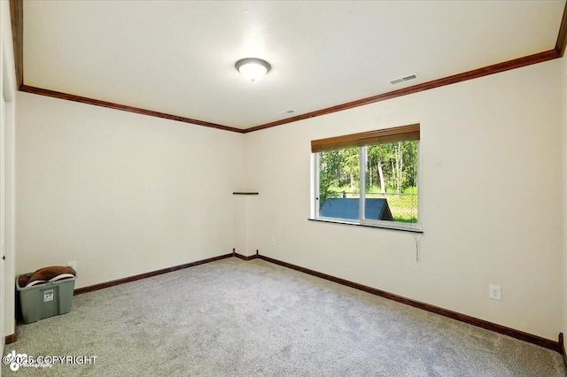 4920 W Fairview Loop, Wasilla, AK 99654 - unfurnished room featuring carpet flooring and crown molding