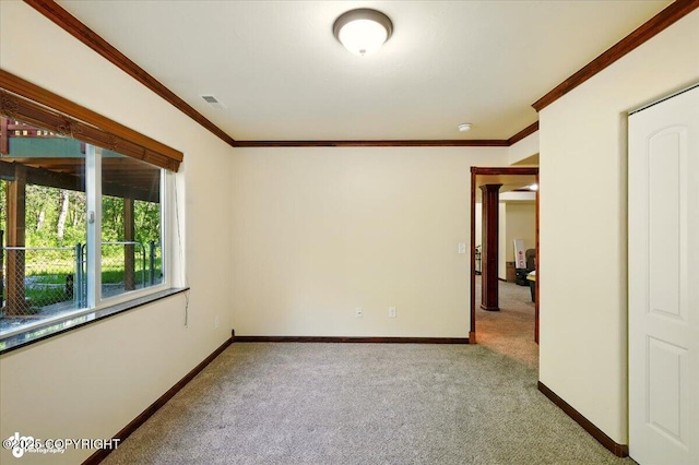 4920 W Fairview Loop, Wasilla, AK 99654 - carpeted empty room with ornamental molding and decorative columns