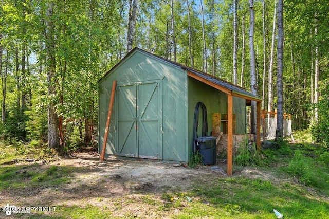 4920 W Fairview Loop, Wasilla, AK 99654 - view of shed featuring a view of trees