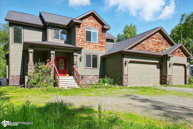 4920 W Fairview Loop, Wasilla, AK 99654 - craftsman-style home with stone siding, an attached garage, driveway, and a shingled roof