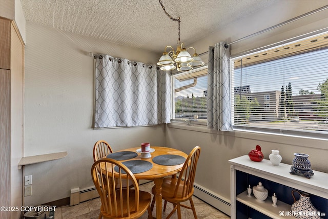 4417 San Roberto Ave, Anchorage, AK 99508 - dining room featuring a chandelier, a baseboard heating unit, a textured ceiling, and baseboards
