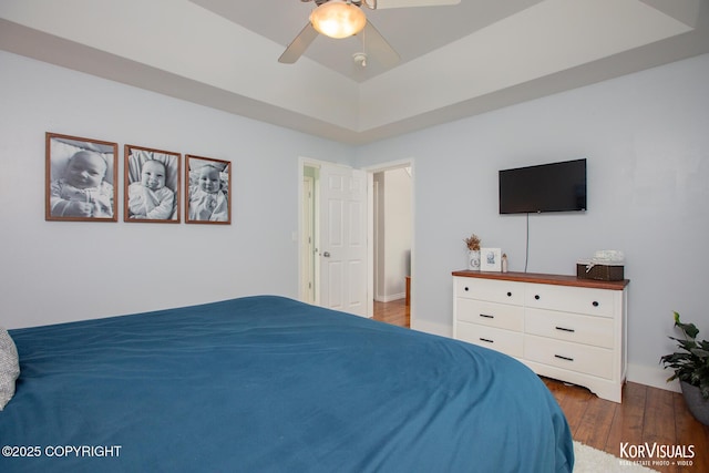 2690 E Tamarak Ave, Wasilla, AK 99654 - bedroom featuring wood finished floors, ceiling fan, and baseboards