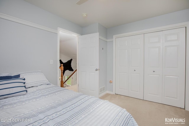 2690 E Tamarak Ave, Wasilla, AK 99654 - bedroom with light colored carpet and a closet