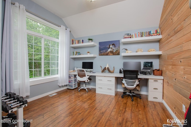 2690 E Tamarak Ave, Wasilla, AK 99654 - office space with built in study area, vaulted ceiling, wood-type flooring, and baseboards