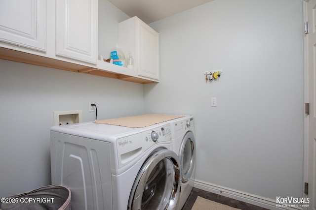 2690 E Tamarak Ave, Wasilla, AK 99654 - laundry room with cabinet space, washer and clothes dryer, and baseboards
