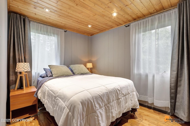 3200 E 15th Ave, Anchorage, AK 99508 - bedroom featuring wooden ceiling, multiple windows, wood finished floors, and recessed lighting