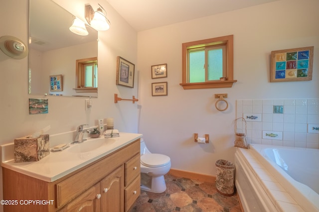 2032 Horizon Ct, Homer, AK 99603 - bathroom featuring vanity, toilet, a bath, and baseboards